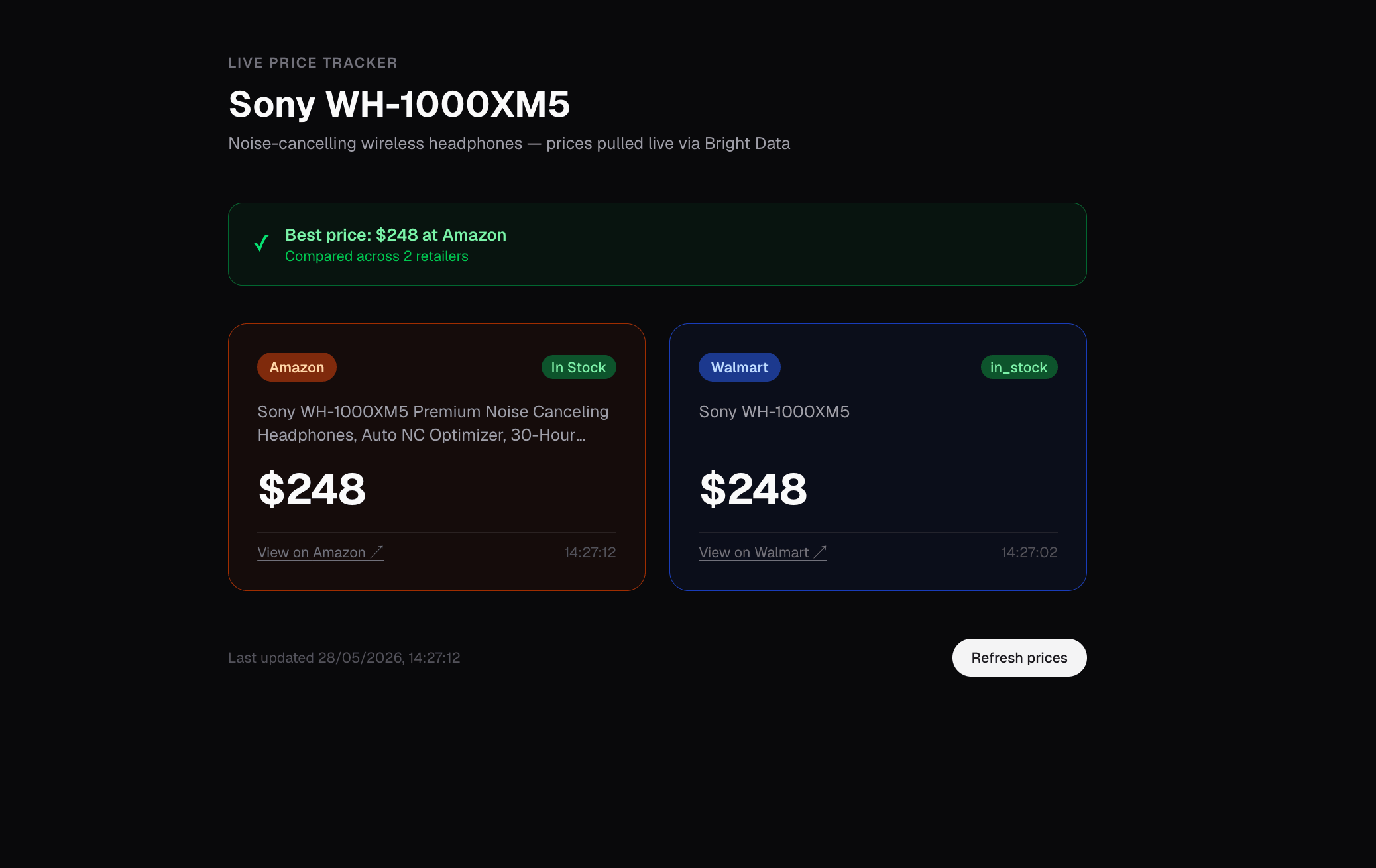 2026年5月28日14:27のホームルート(/)：Sony WH-1000XM5がAmazonとWalmartの両方で$248と表示され、Amazonに緑の「最安値」バナーが付いたカード表示。